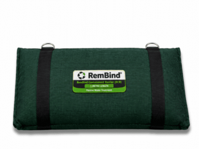 A green RemBind Containment Barrier, a fabric treatment pillow with webbing straps and lifting rings, labelled RCB one metre length.