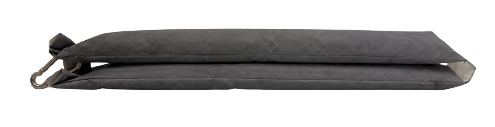 A cylindrical RemBind Well Sock, a nylon outer sock filled with RemBind sorbent reagent.