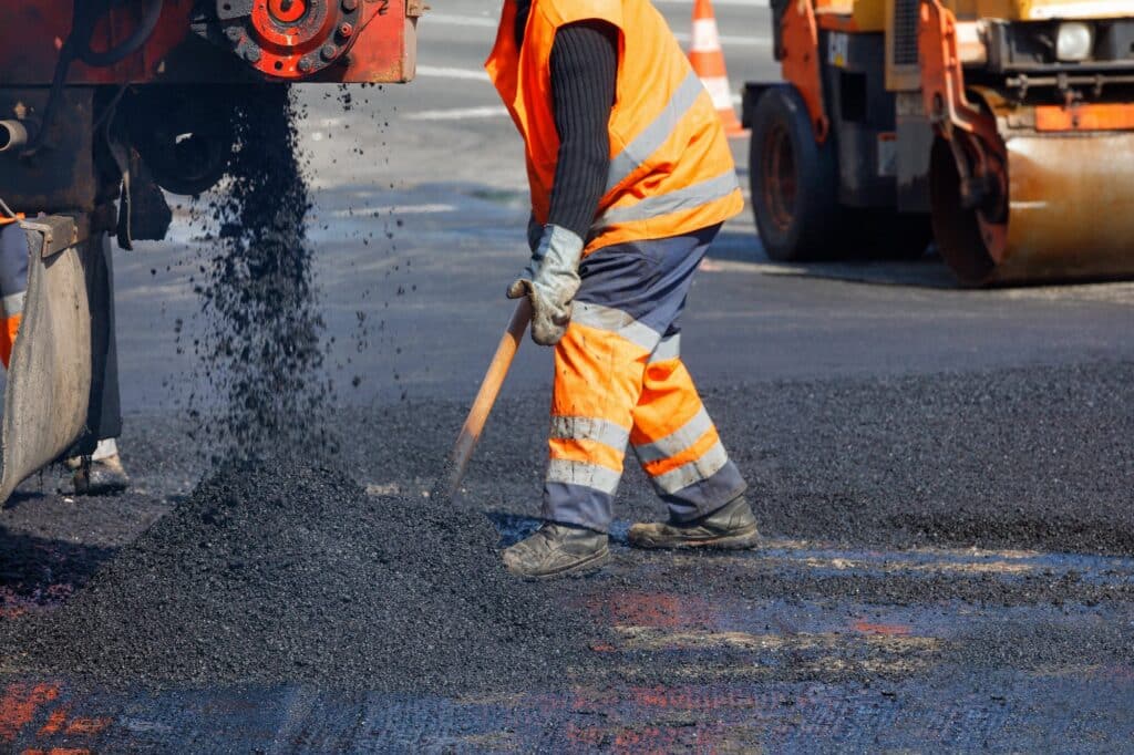 Freshly laid asphalt pavement surface.