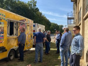 Carus employees enjoying a special visit from the Grandma Rosie's ice cream truck